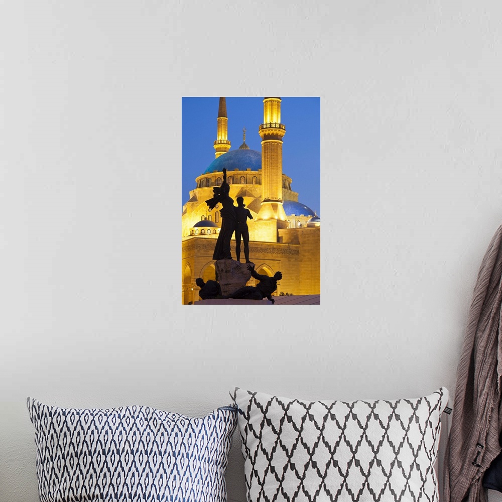 A bohemian room featuring Lebanon, Beirut. Statue in Martyr's Square and Mohammed Al-Amin Mosque at dusk.
