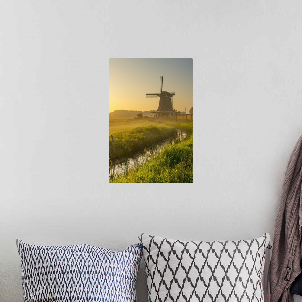 A bohemian room featuring Netherlands, North Holland, Zaandam, Zaanse Schans, The Seeker (De Zoeker) Oilmill at sunrise