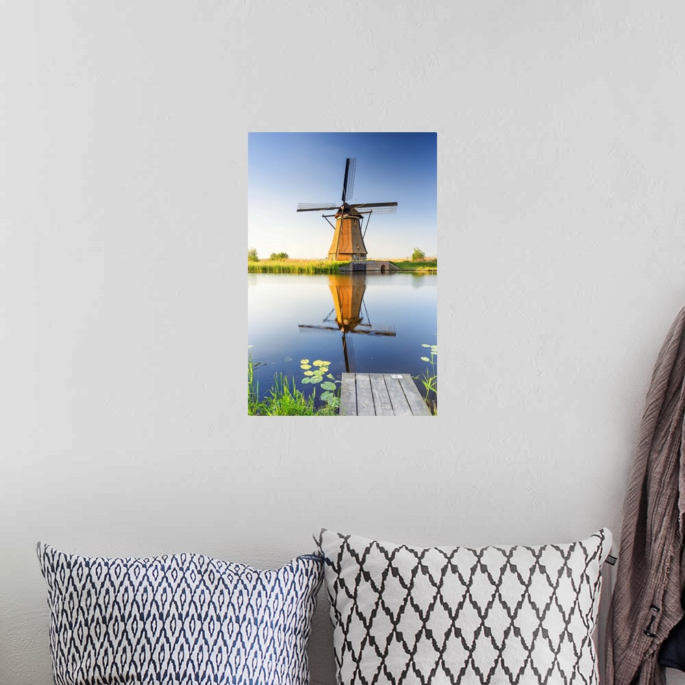 A bohemian room featuring Netherlands, South Holland, Kinderdijk. Windmills