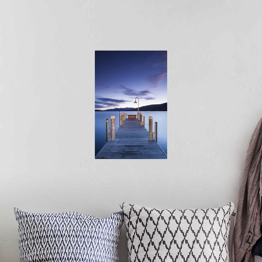 A bohemian room featuring USA, New York, Adirondack Mountains, Lake George, boat pier, dawn