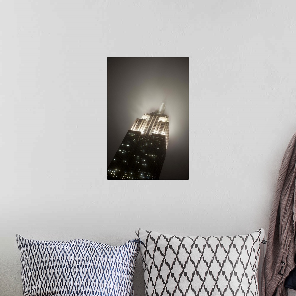 A bohemian room featuring USA, New York City, Manhattan, Empire State Building on a rainy evening- low angle view