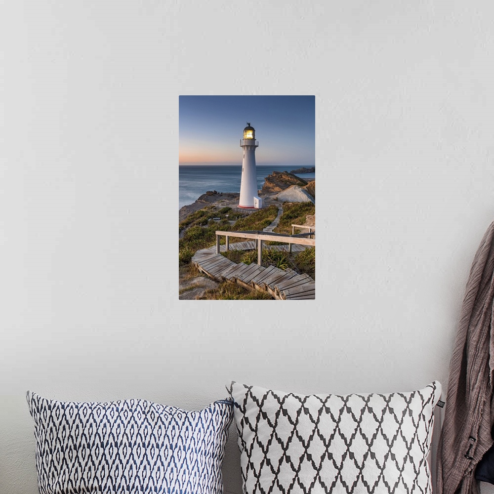 A bohemian room featuring New Zealand, North Island, Castlepoint Lighthouse, morning light.