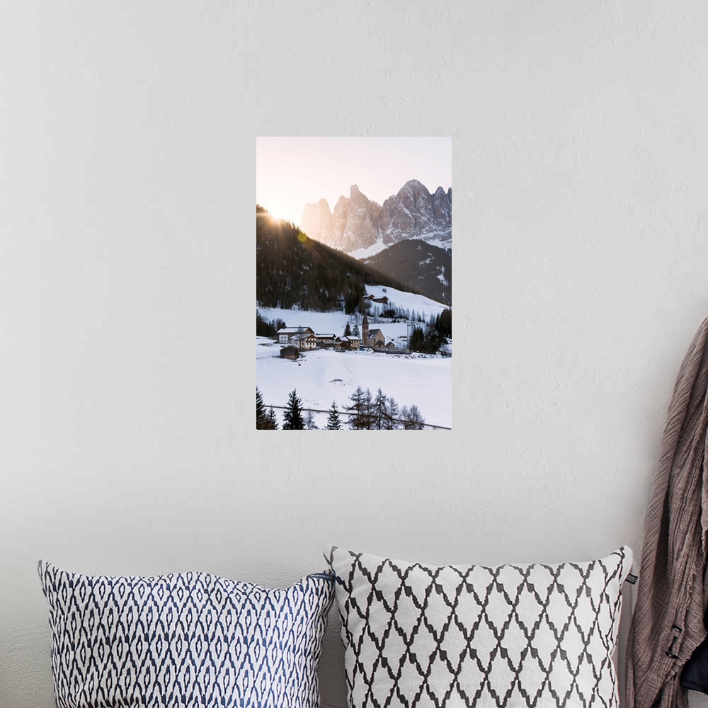 A bohemian room featuring Sankt Magdalena in a winter sunrise in Funes valley, Odle Natural park in Trentino Alto Adige dis...
