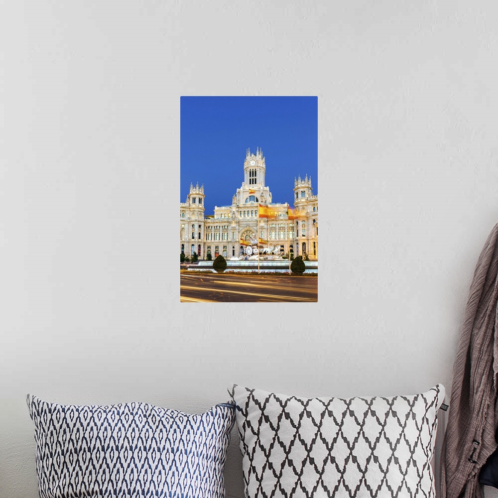 A bohemian room featuring Spain, Madrid. Plaza de Cibeles with famous fountain and town hall building behind
