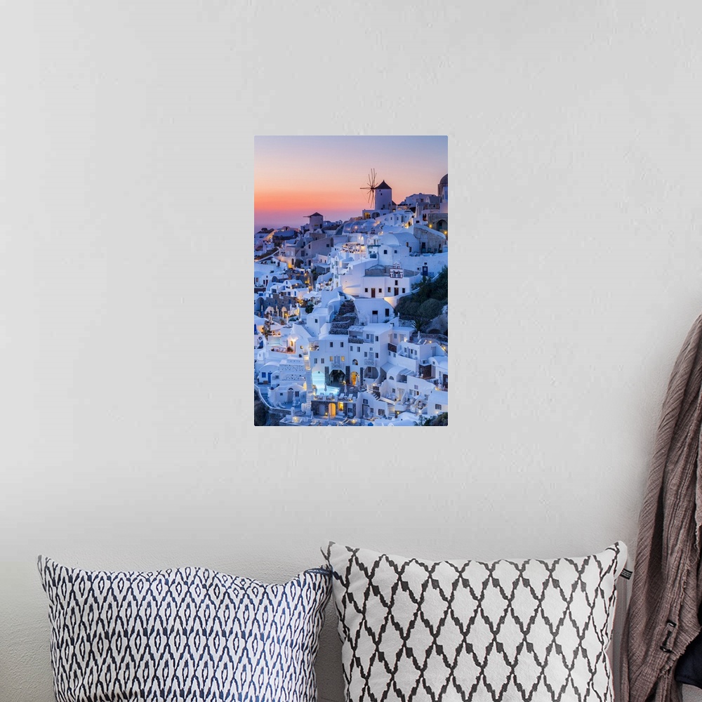 A bohemian room featuring Sunset at the village of Oia in Santorini, Cyclades Islands, Greece.
