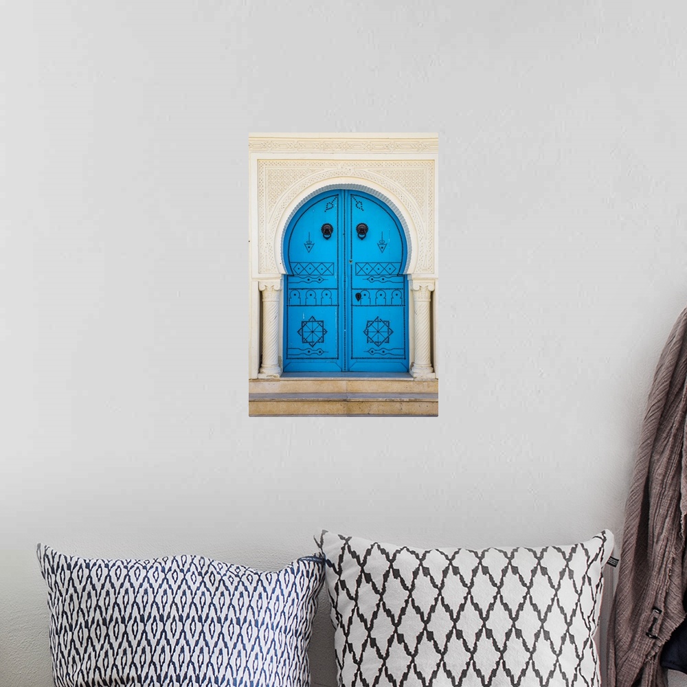 A bohemian room featuring Tunisia, Kairouan, Madina, Blue door.