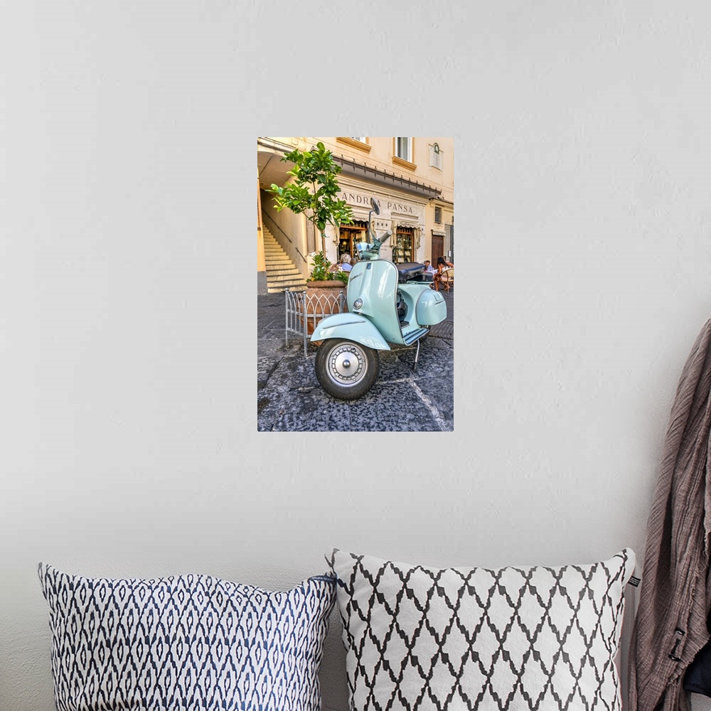 A bohemian room featuring Vespa scooter parked in Amalfi, Campania, Italy