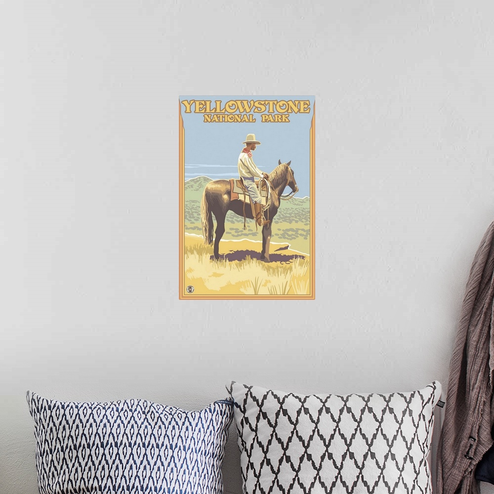 A bohemian room featuring Cowboy on Horseback - Yellowstone National Park: Retro Travel Poster