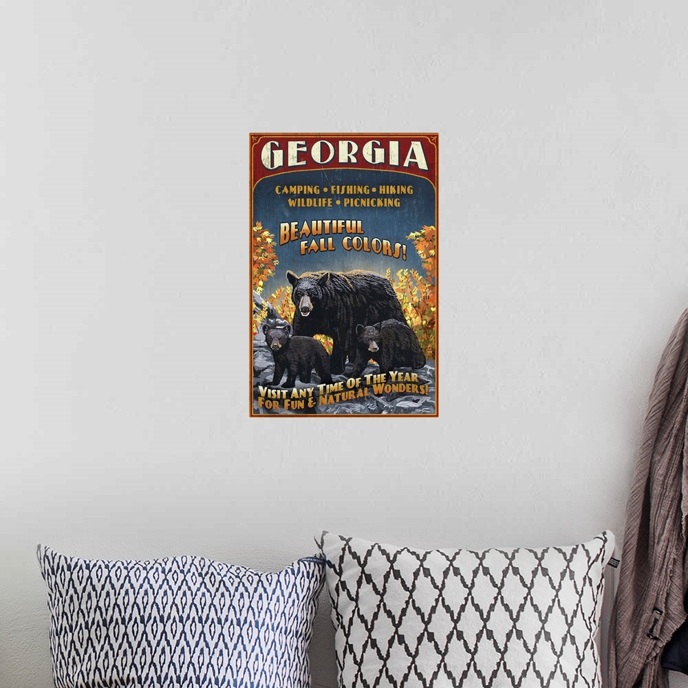 A bohemian room featuring Retro stylized art poster of a black bear mother with her two cubs in the wild.