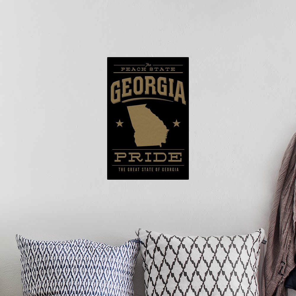 A bohemian room featuring The Georgia state outline on black with gold text.