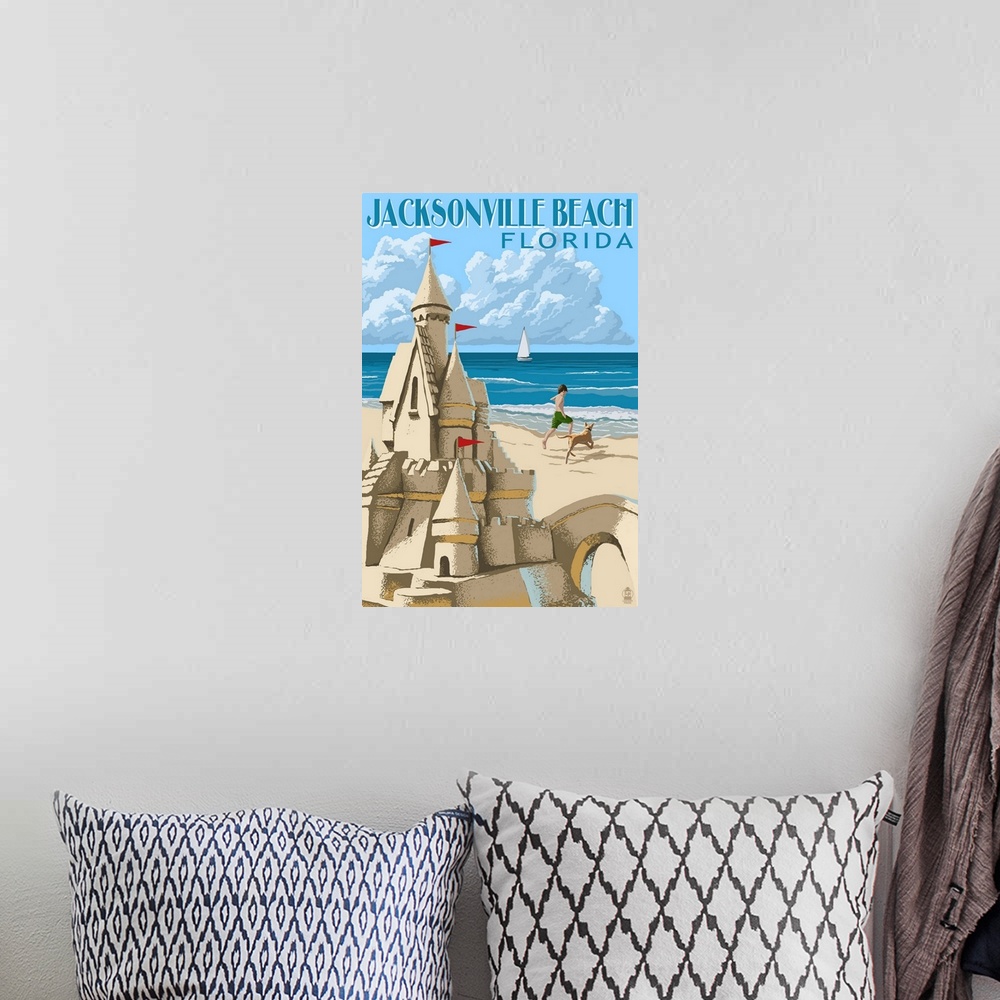 A bohemian room featuring Retro stylized art poster of sand castle on a beach, with a child and dog playing in the background.
