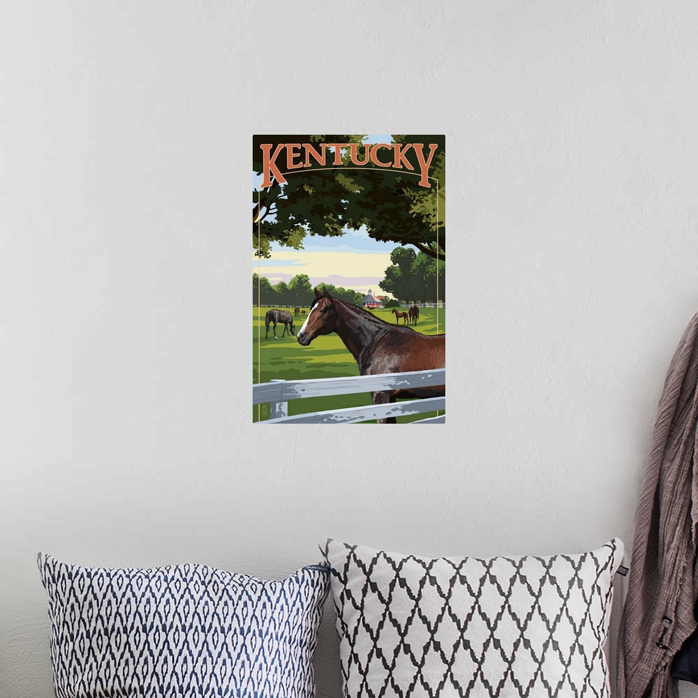 A bohemian room featuring Retro stylized art poster of a field of horses, with a white picket fence in the foreground.