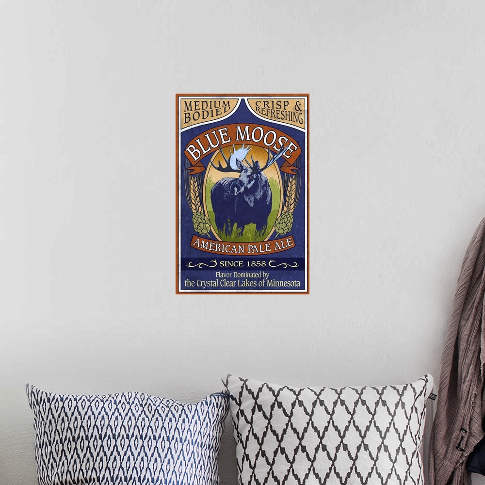 A bohemian room featuring Retro stylized art poster of a vintage sign using a moose to advertise ale.