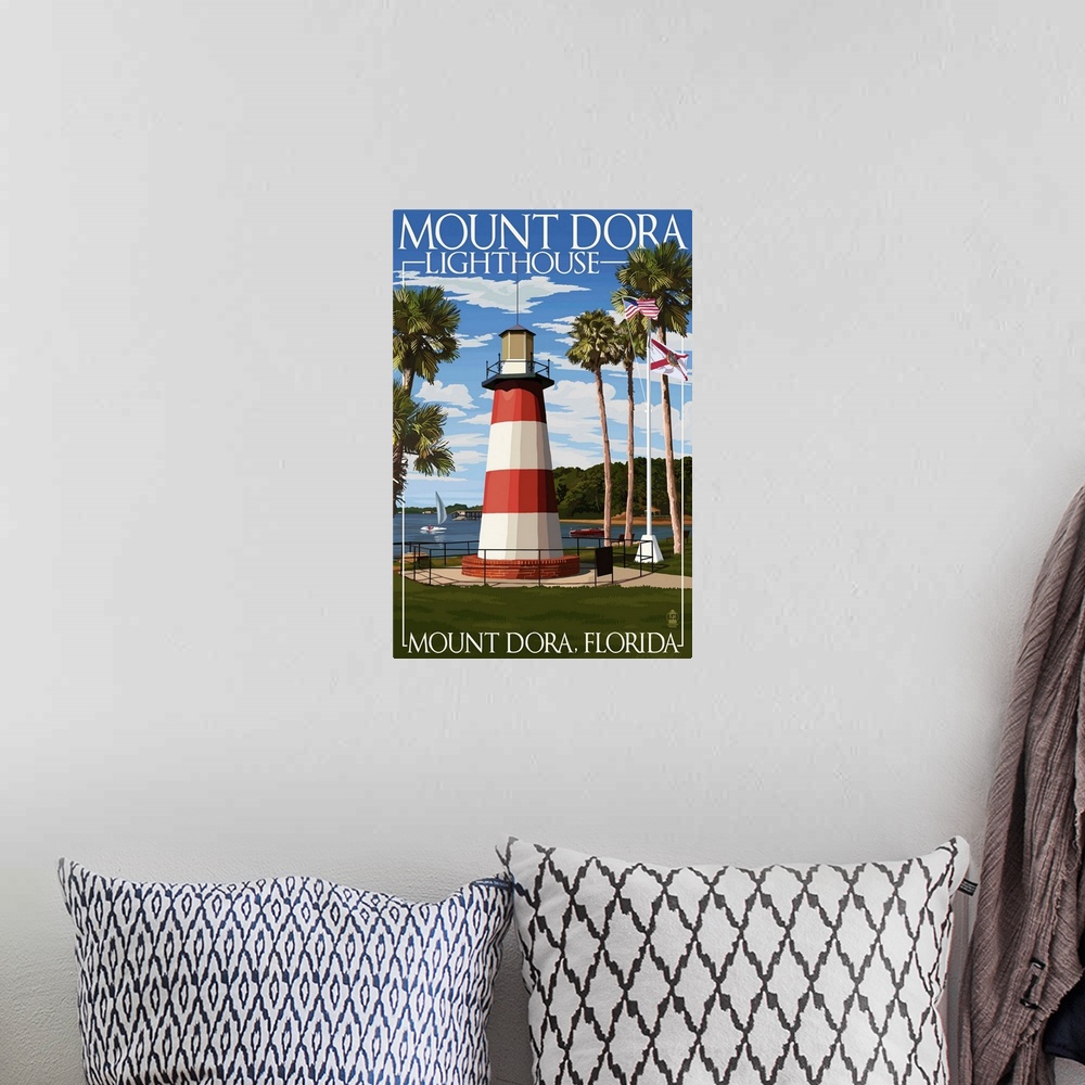 A bohemian room featuring Retro stylized art poster of a striped lighthouse surrounded by tall palm trees.
