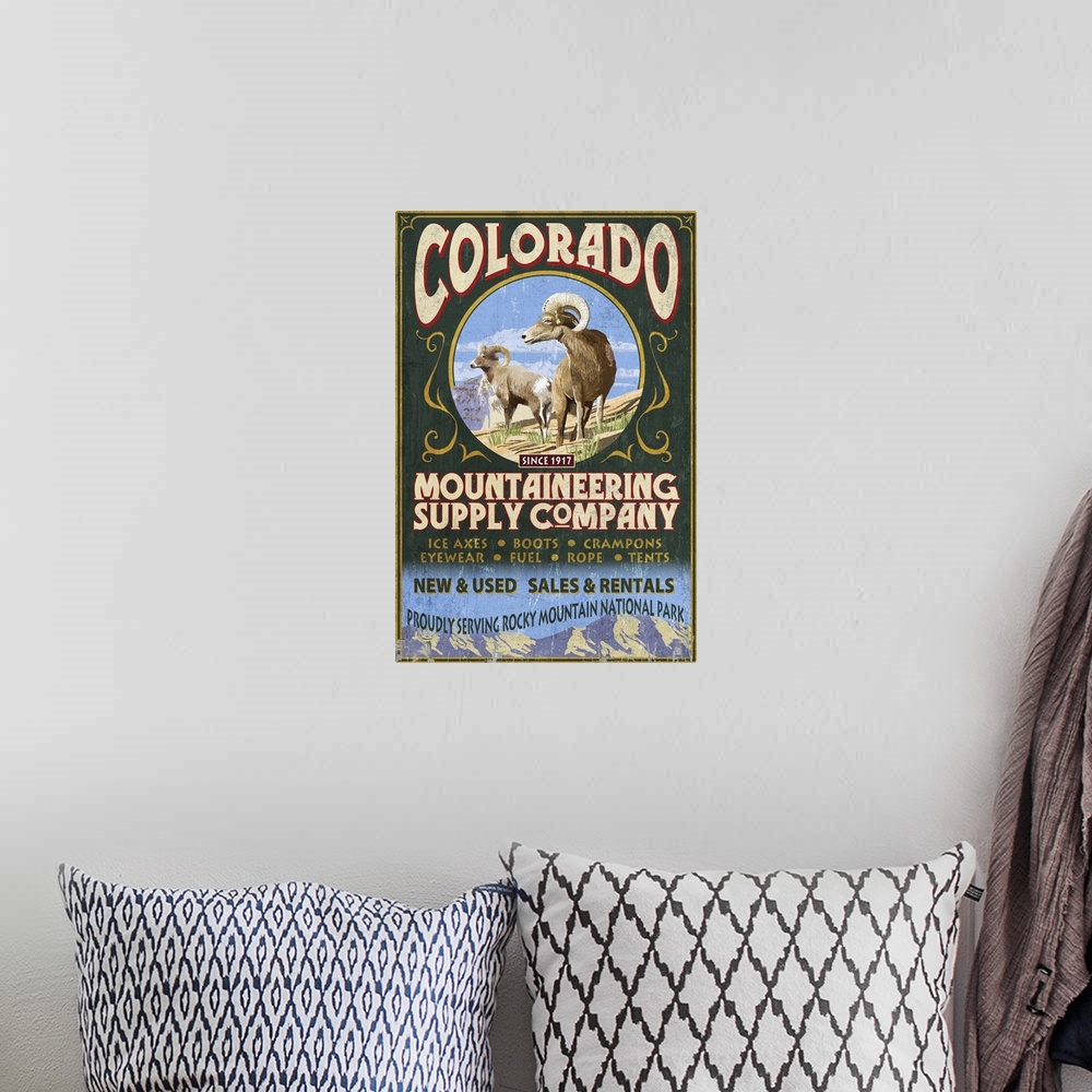 A bohemian room featuring Mountaineering Supply - Rocky Mountain National Park: Retro Travel Poster