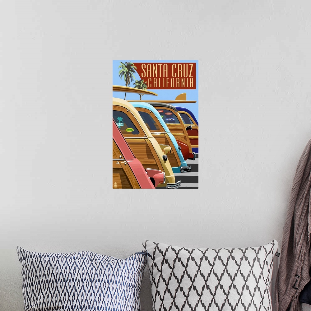 A bohemian room featuring Retro stylized art poster of a row of vintage woody wagons, with surfboard on top of them.