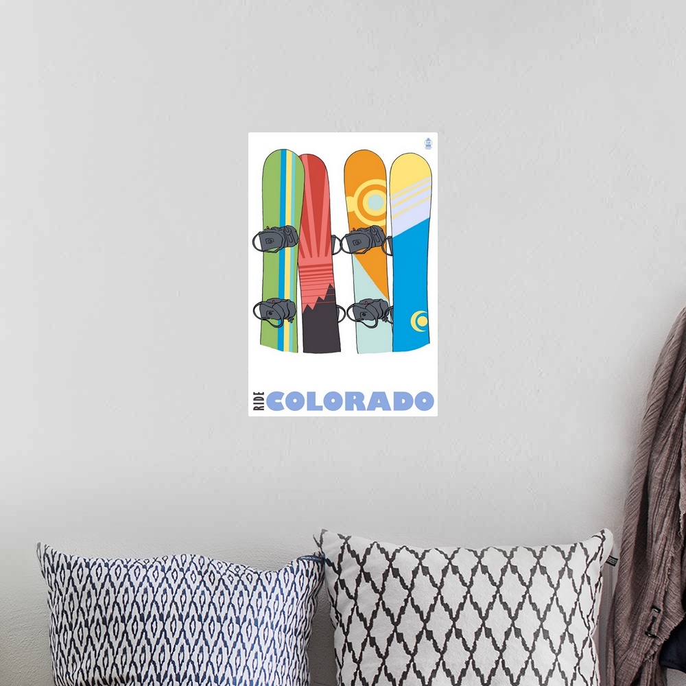 A bohemian room featuring Snowboards in Snow - Colorado: Retro Travel Poster