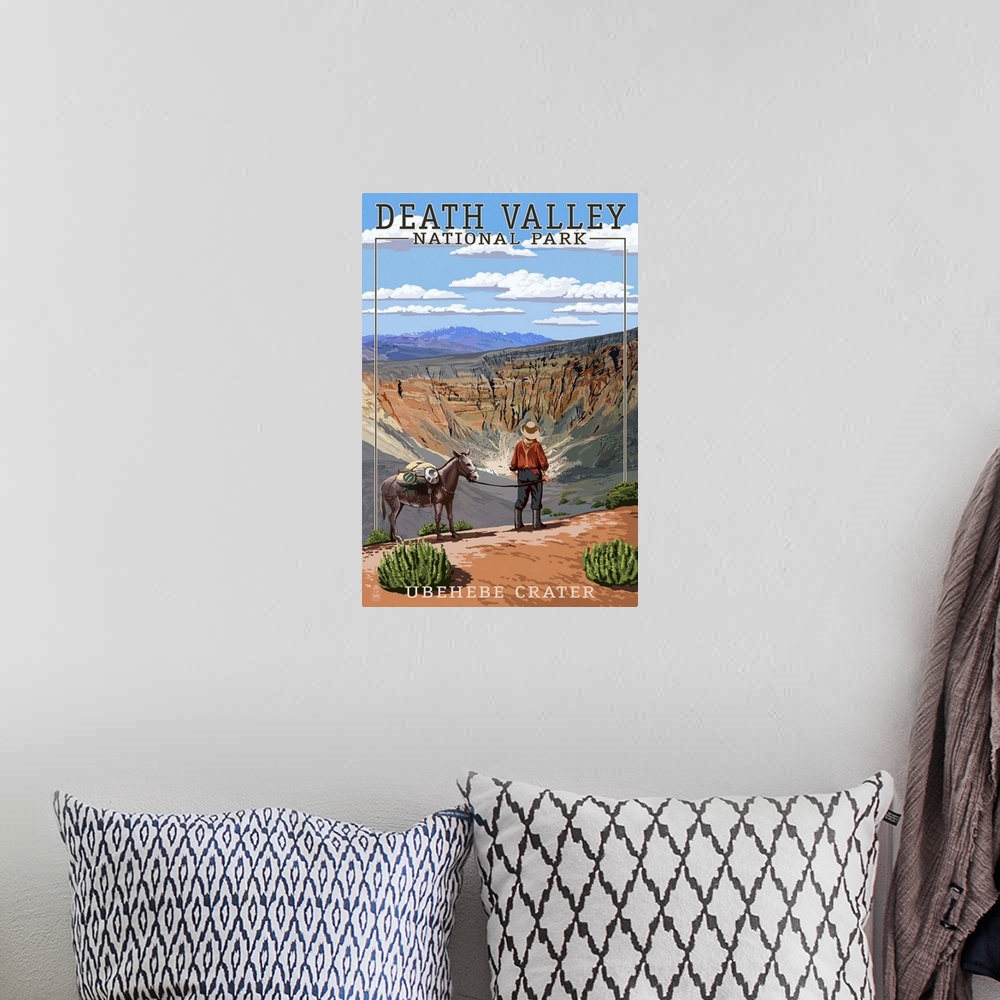 A bohemian room featuring Retro stylized art poster of a man and a donkey overlooking a desert valley.