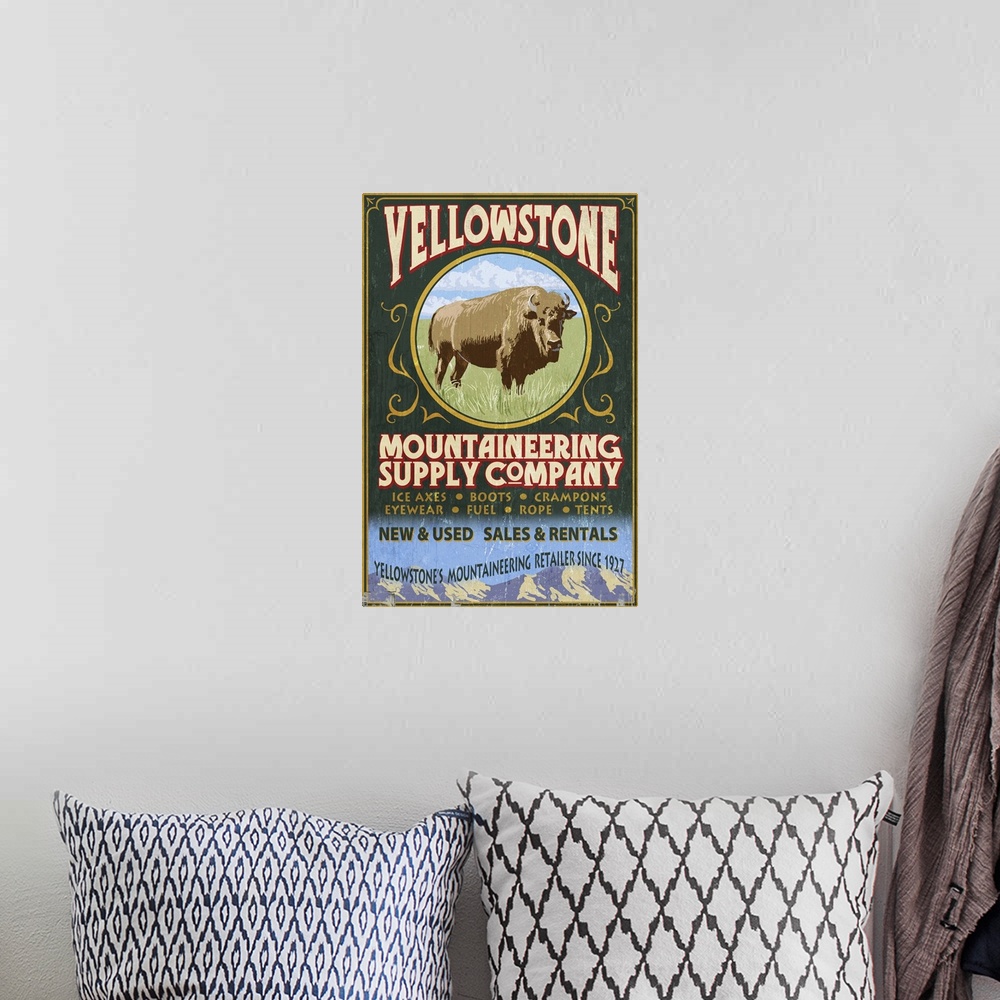 A bohemian room featuring Yellowstone National Park - Bison Mountaineering Vintage Sign: Retro Travel Poster