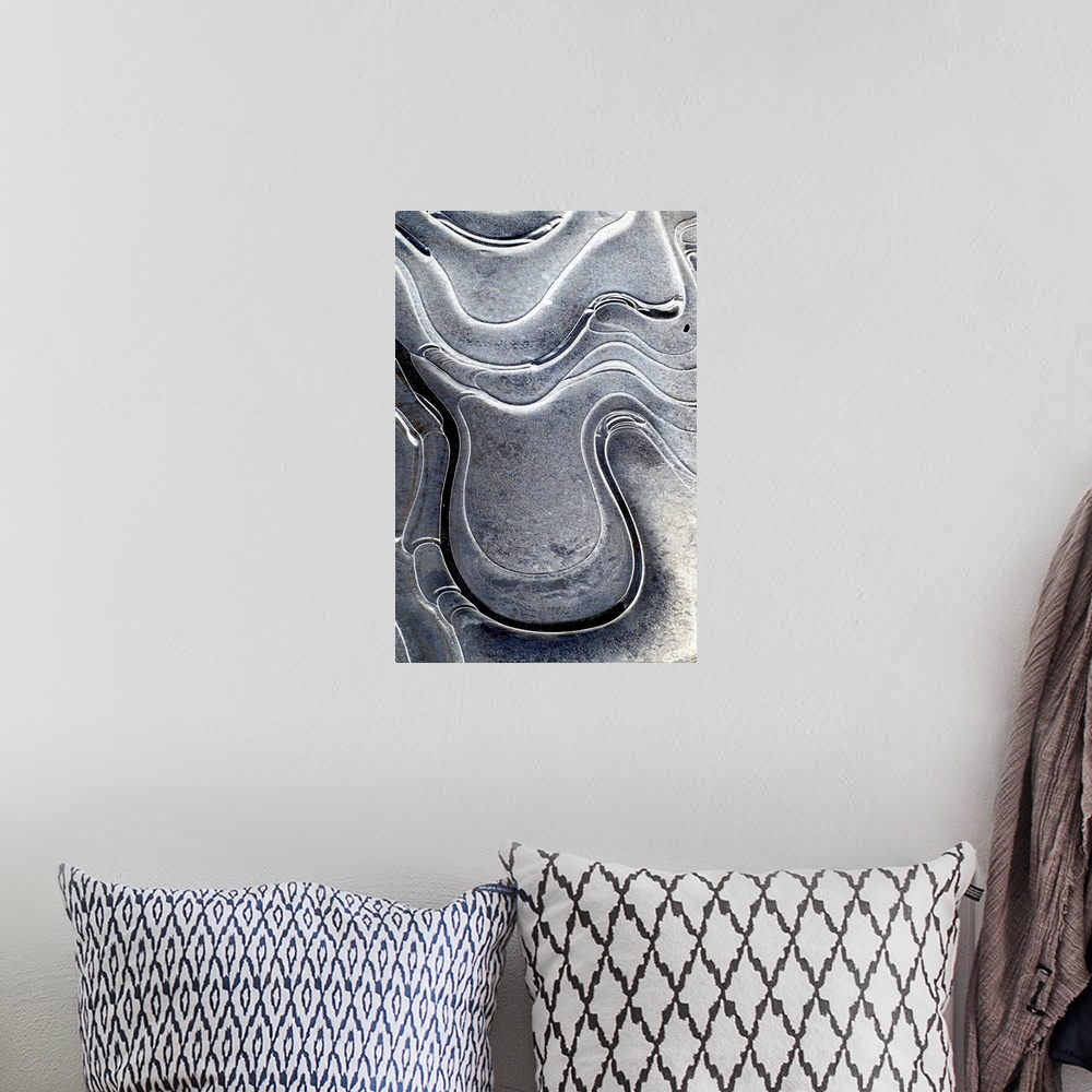 A bohemian room featuring This is a fine art photograph of curving shapes and monochromic sheens of bright to dark on a ver...