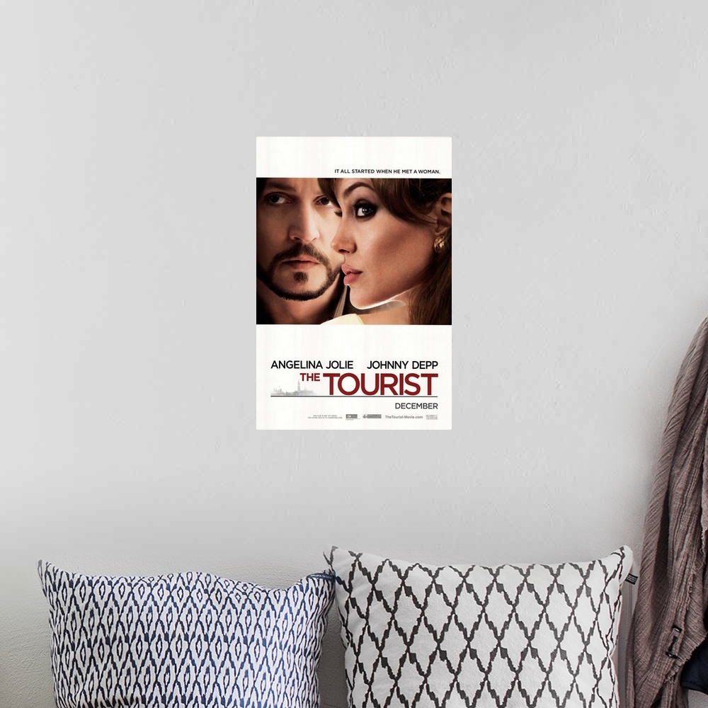 A bohemian room featuring The Tourist - Movie Poster