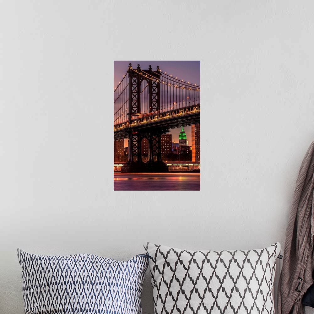 A bohemian room featuring A photograph of the Manhattan bridge at twilight.