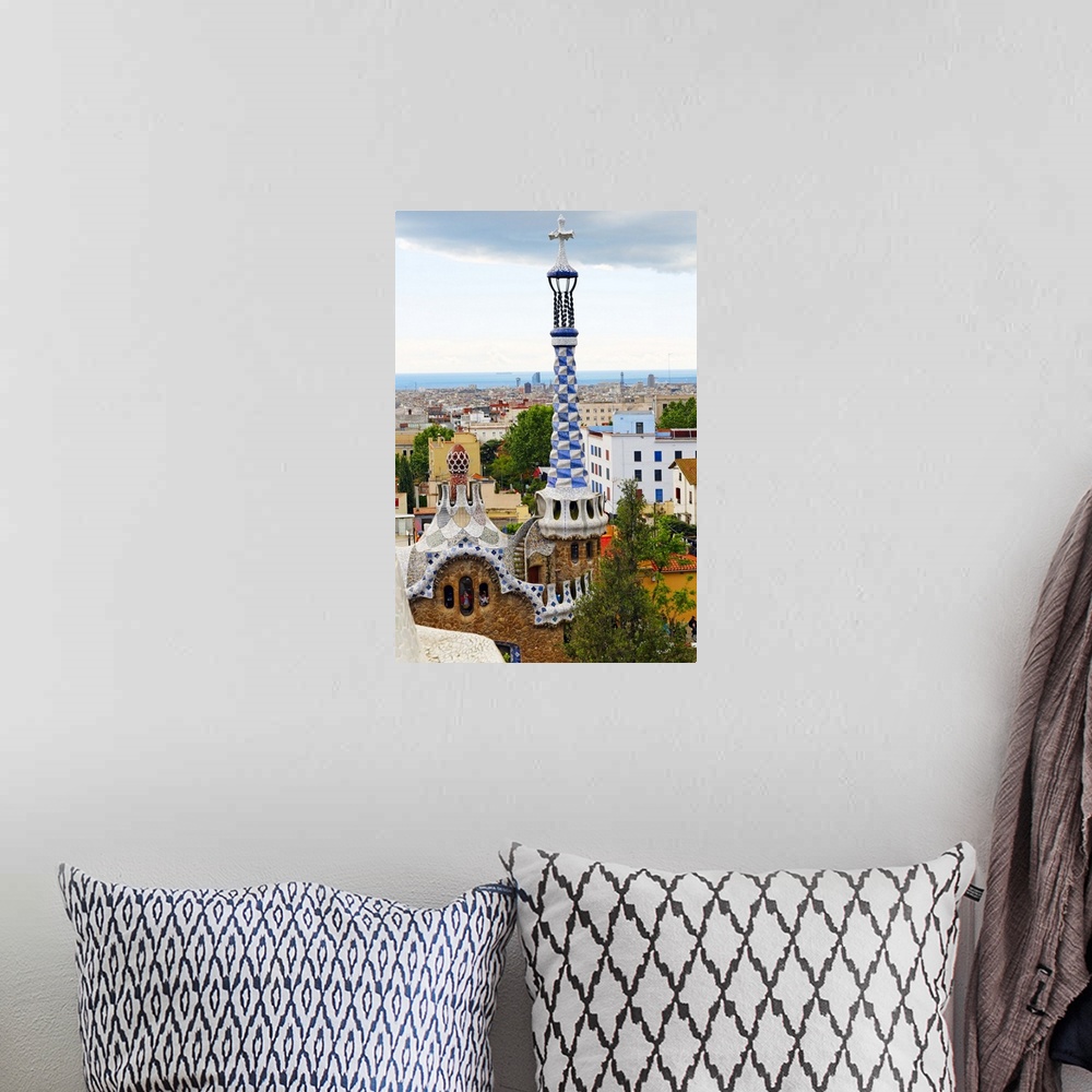 A bohemian room featuring High Angle View of the Gatehouse with White and Blue Tower, Park Guell