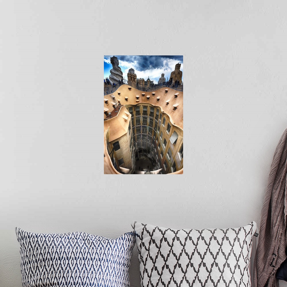 A bohemian room featuring Rooftop View of Casa Mila (La Pedrera) With Group of Chimneys