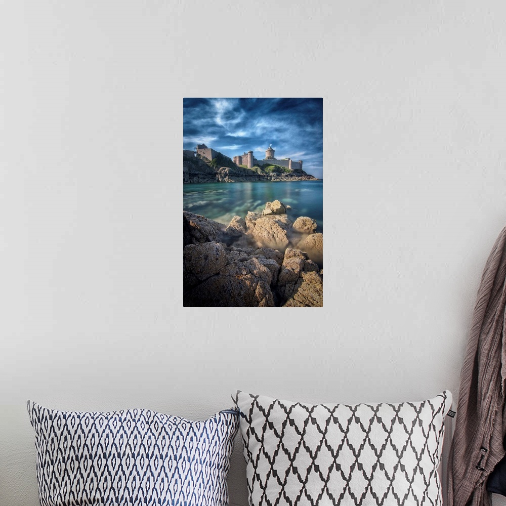 A bohemian room featuring Vertical view of a castle facing the sea and the rock, the place of Fort la Latte, in Brittany in...