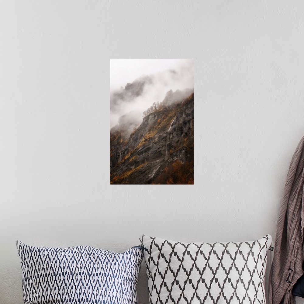 A bohemian room featuring Vertical view of a moutain in Sixt-Fer-a-Cheval area in the French Alps, some fog and a little wa...