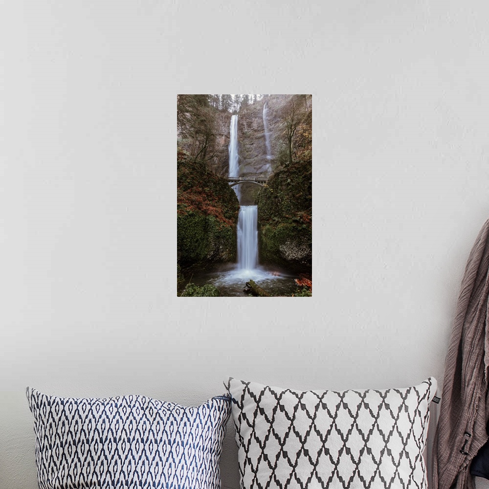 A bohemian room featuring Two tiered Multnomah Falls, the tallest waterfall in Oregon, in fall color.