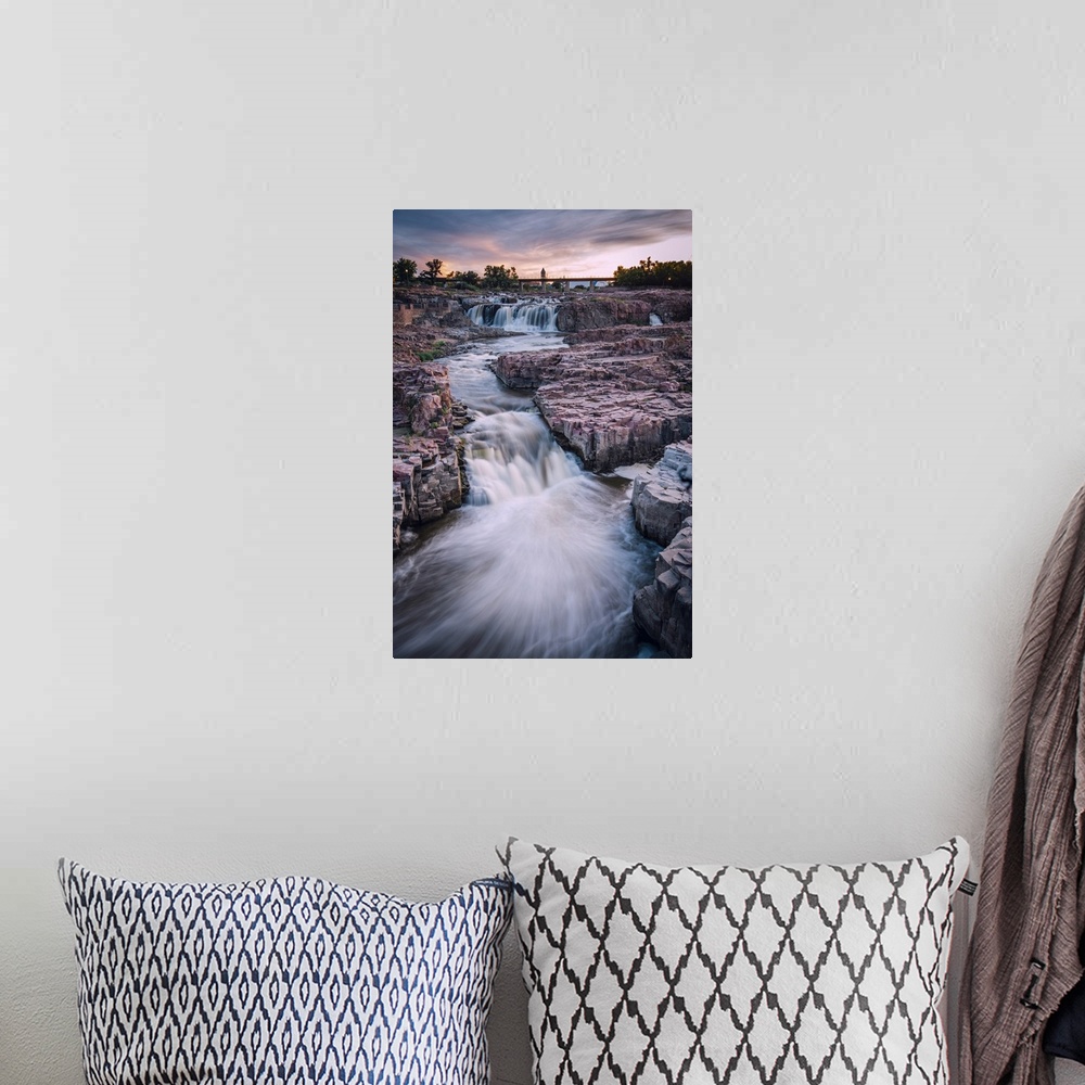 A bohemian room featuring Cascading waterfall in Sioux Falls South Dakota during sunset.