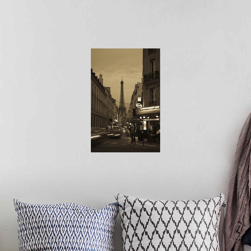A bohemian room featuring Vertical photo on canvas of a street with the Eiffel Tower in the background at dusk.
