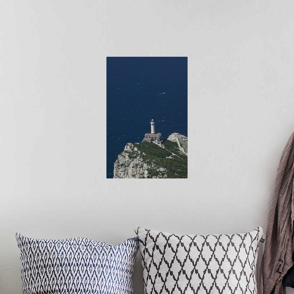 A bohemian room featuring High angle view of a lighthouse on an island, Punta Carena Lighthouse, Capri, Naples, Campania, I...