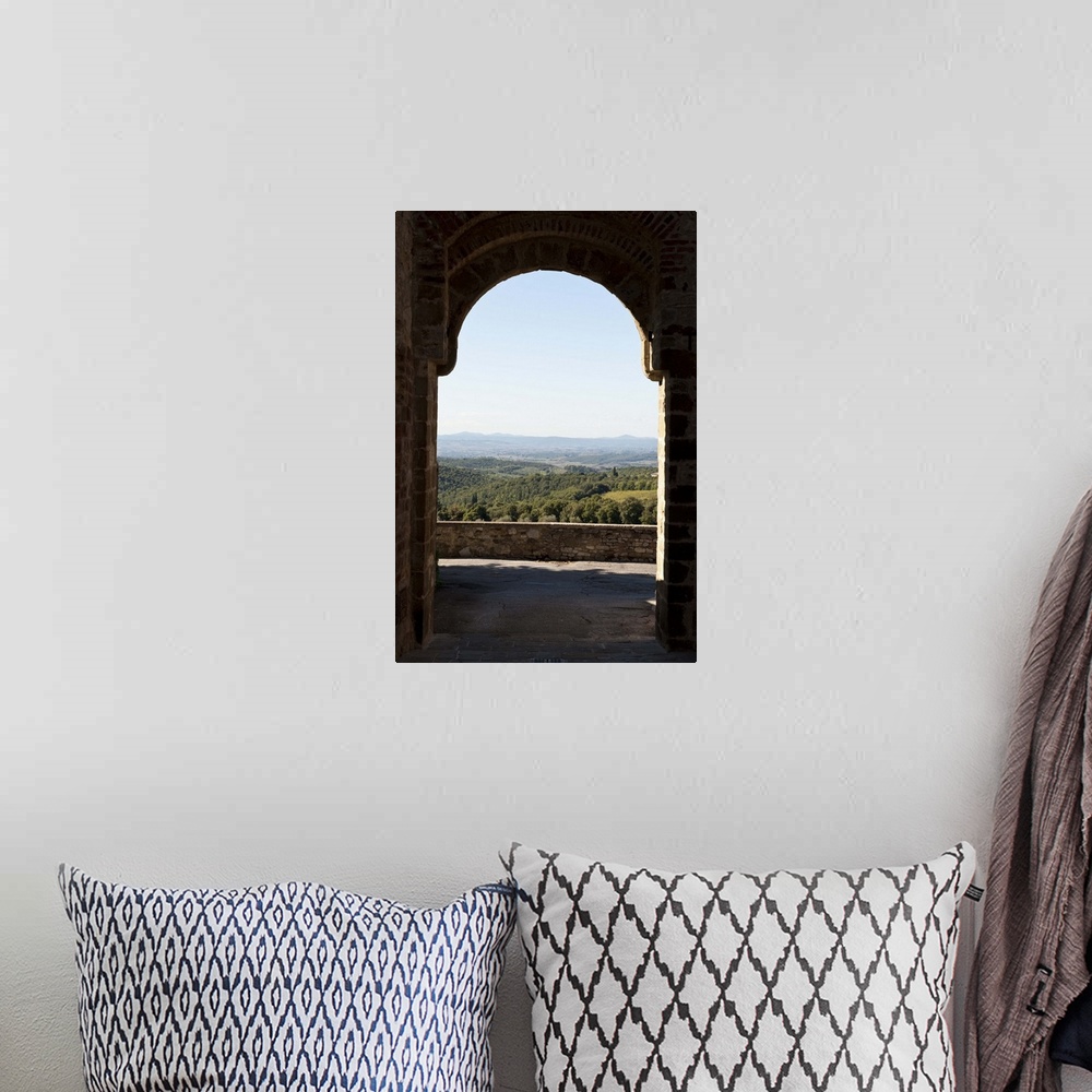 A bohemian room featuring Landscape viewed through an arch, San Gusme, Tuscany, Italy