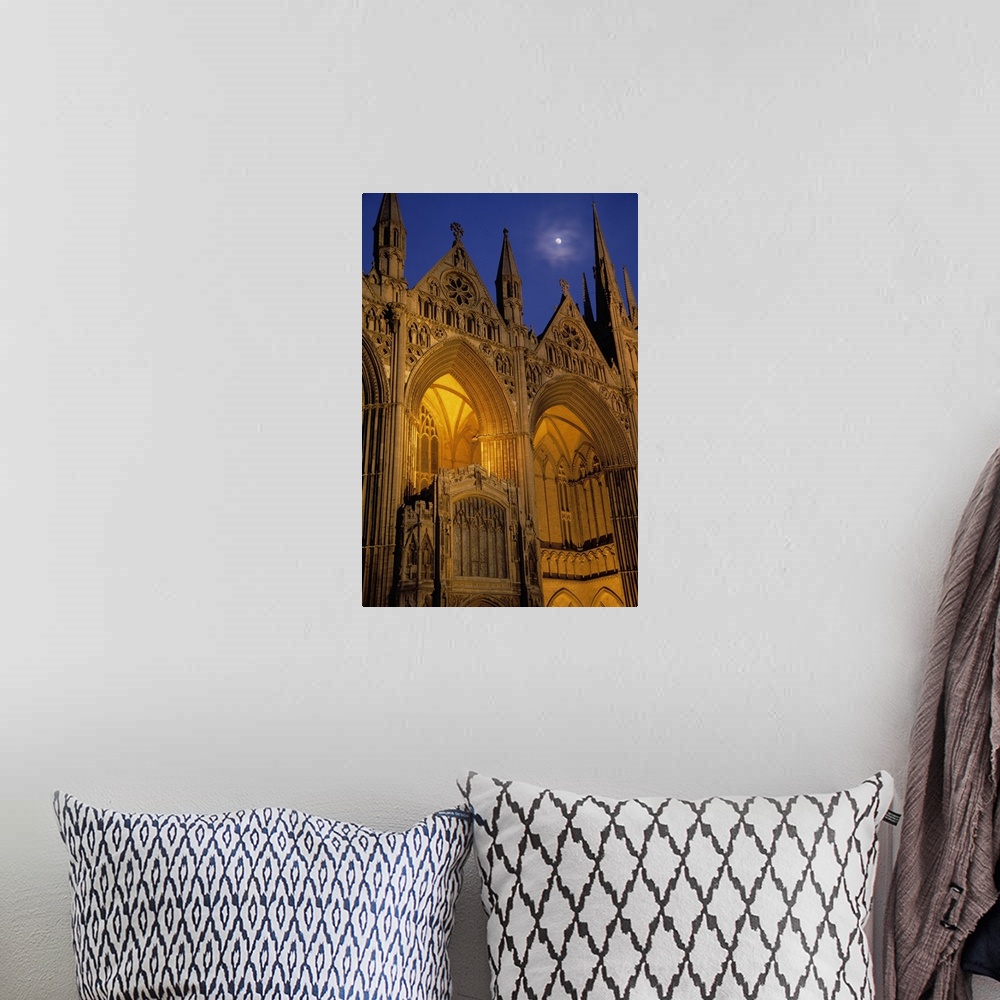 A bohemian room featuring Moon over Peterborough Cathedral illuminated at night, Peterborough, England.
