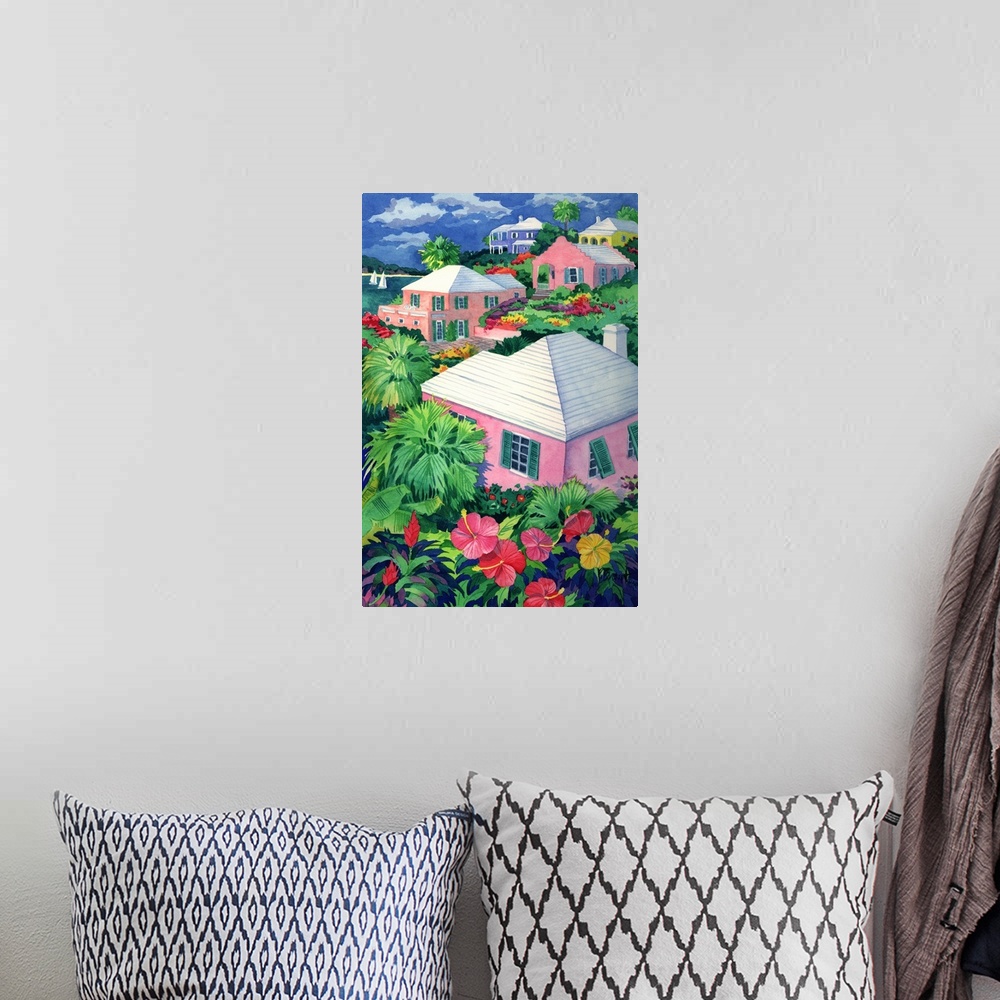 A bohemian room featuring Contemporary painting of several pink cottages with palm trees and hibiscus flowers.