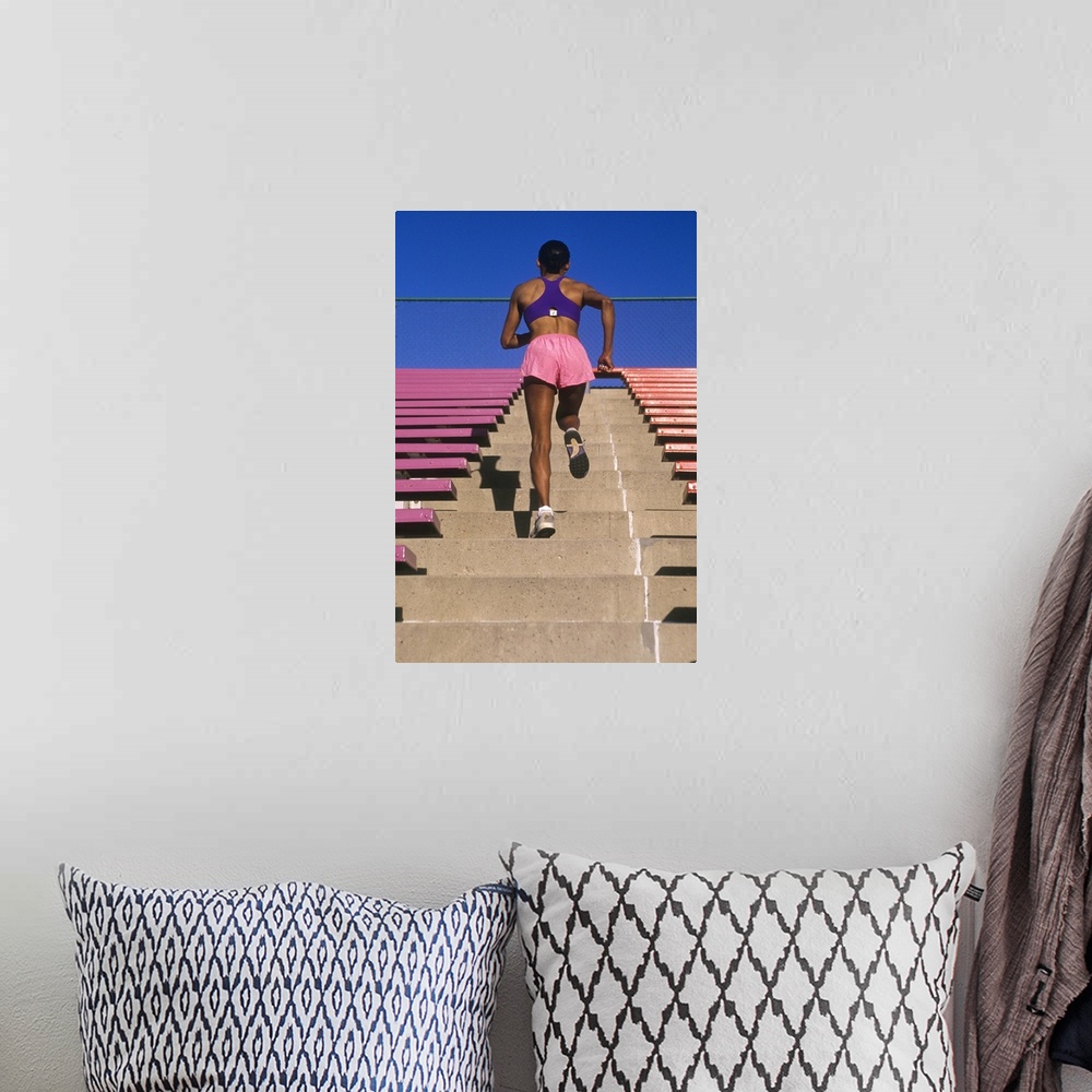 A bohemian room featuring Athletic woman running up stairs