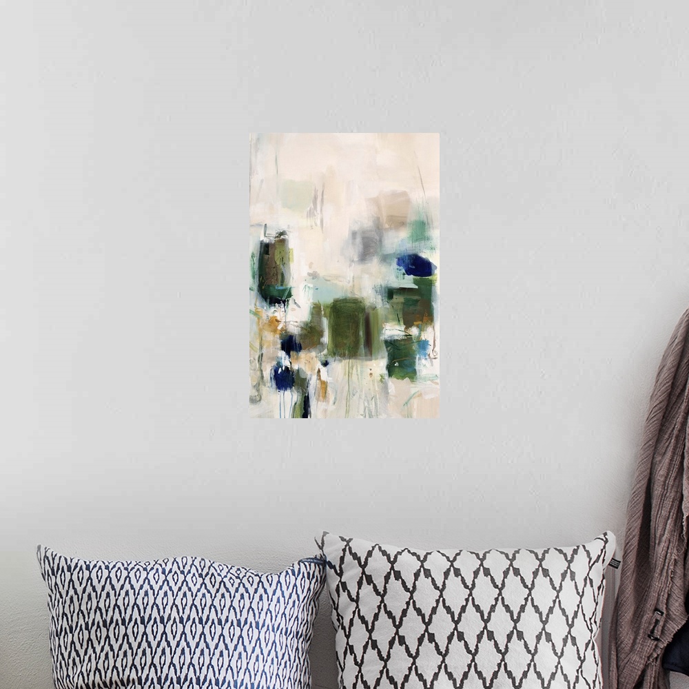 A bohemian room featuring Vertical abstract artwork with vivid squares of green on white.