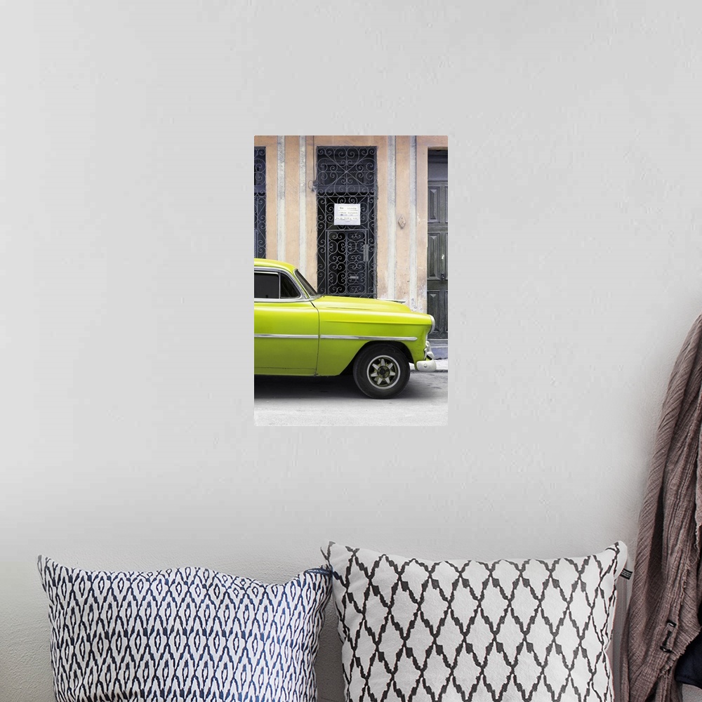 A bohemian room featuring Photograph of a lime green vintage car parked outside in the streets of Havana.