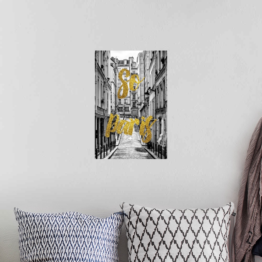 A bohemian room featuring Black and white photograph of a street surrounded by buildings in Paris, France with the phrase "...