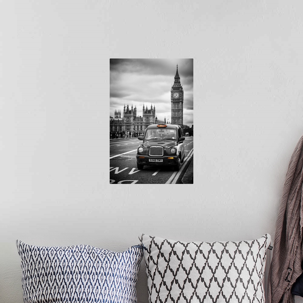 A bohemian room featuring A Taxi driving past Big Ben on a cloudy day.