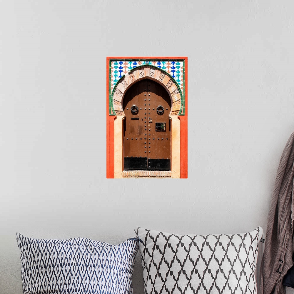 A bohemian room featuring It's an old colorful wooden door arabic style in Granada, Spain.