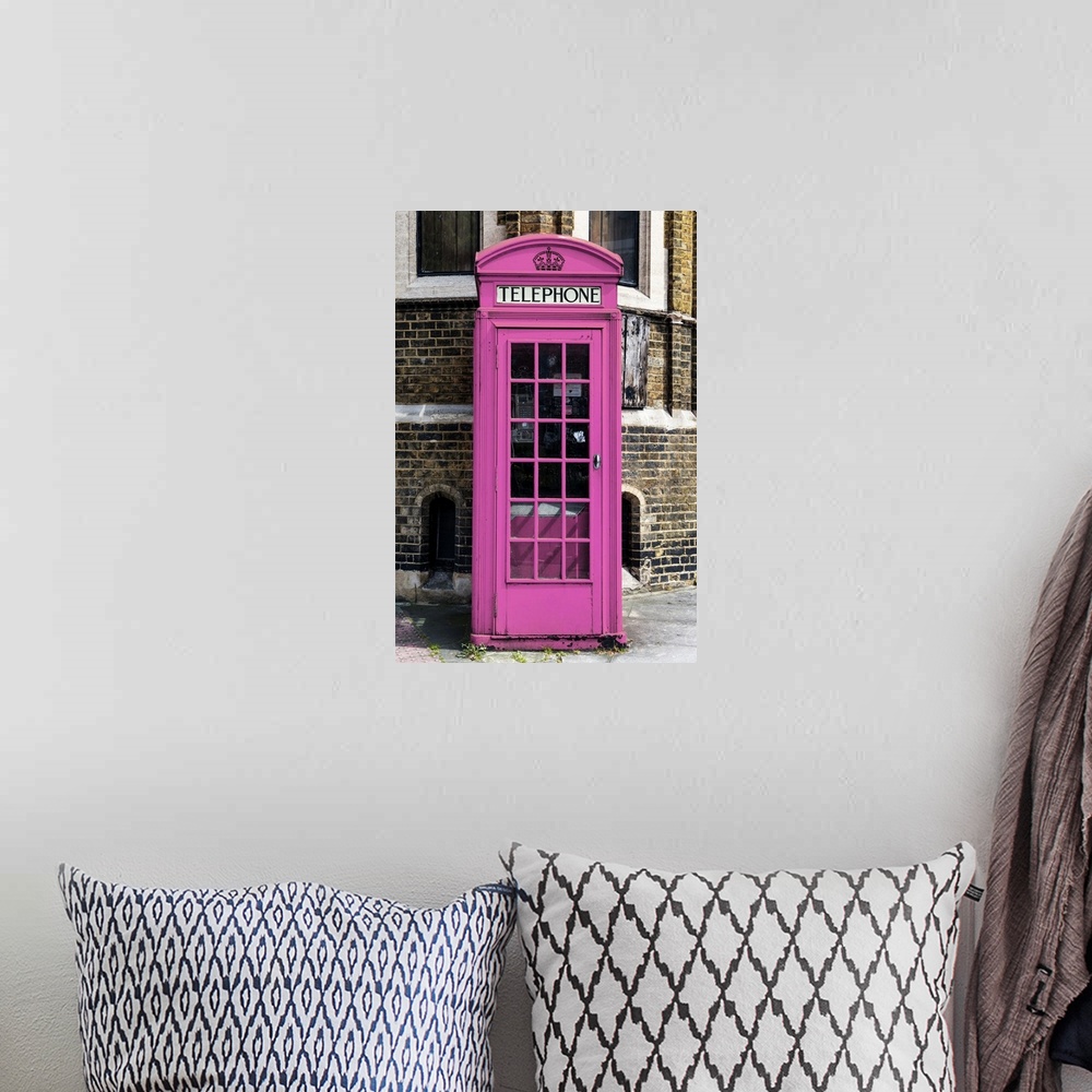 A bohemian room featuring Fine art photo of an iconic telephone booth, painted unusually pink, on a London street corner.