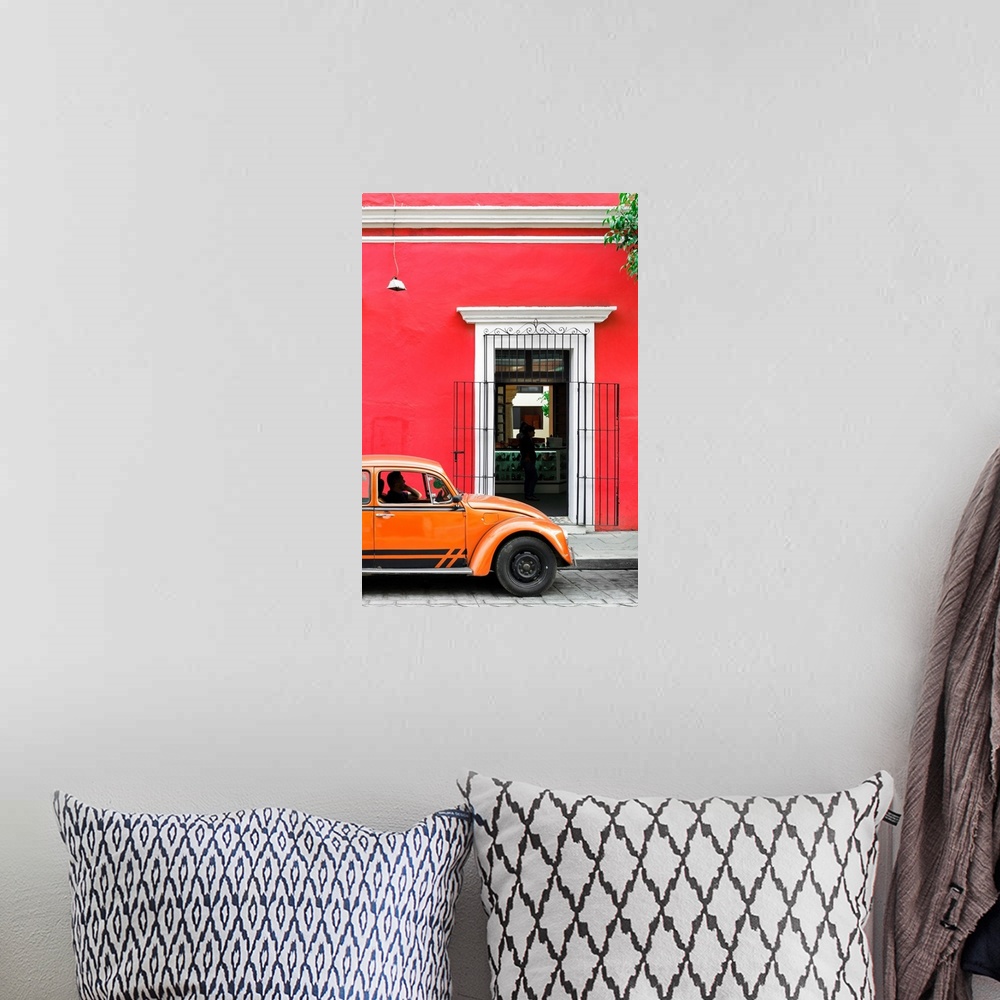 A bohemian room featuring Photograph of a classic orange Volkswagen Beetle in front of a red building, Mexico. From the Viv...