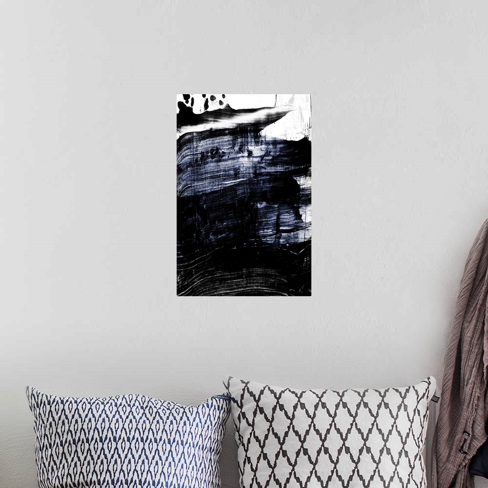 A bohemian room featuring Abstract painting of large black and blue brush strokes on white