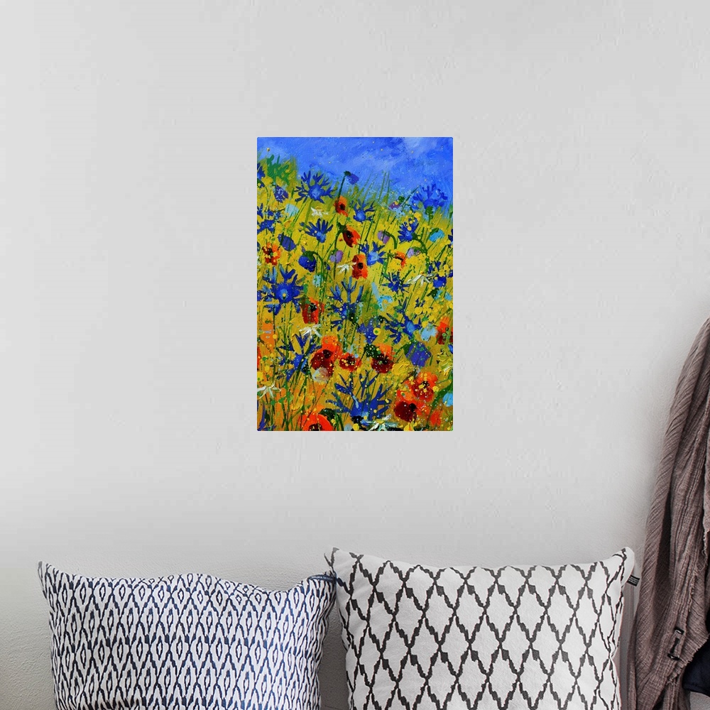 A bohemian room featuring Vertical painting of colorful flowers in a garden and a bright blue sky with small speckles of pa...