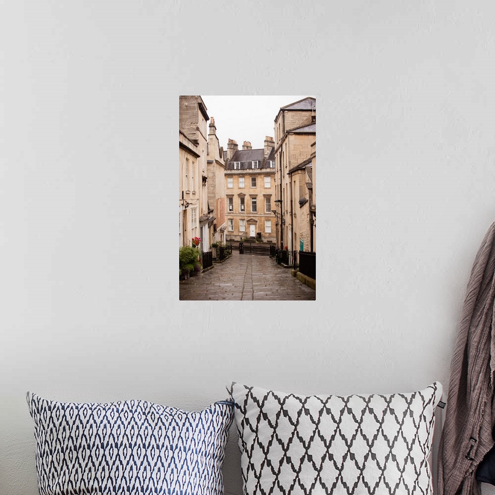 A bohemian room featuring Photograph of neighborhood architecture and a cobblestone road going through the center in Bath, ...