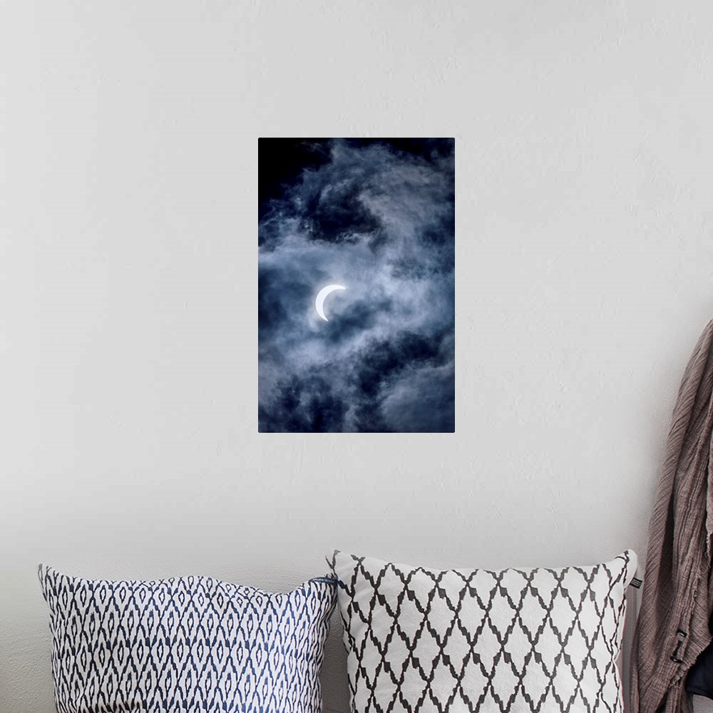 A bohemian room featuring Crescent moon and cloudy skies in Banff National Park, Alberta, Canada.