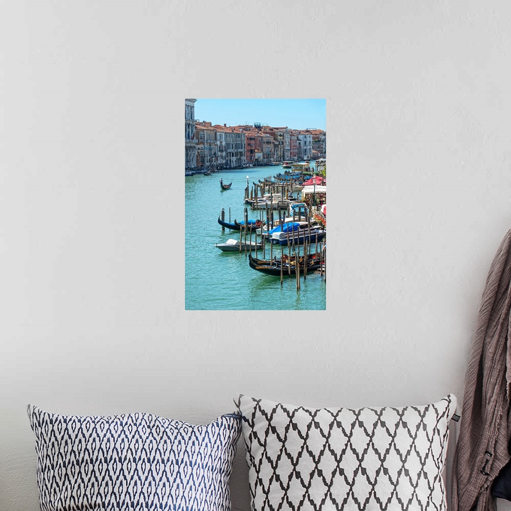 A bohemian room featuring Photograph of docked gondolas and boats on the Grand Canal in Venice.